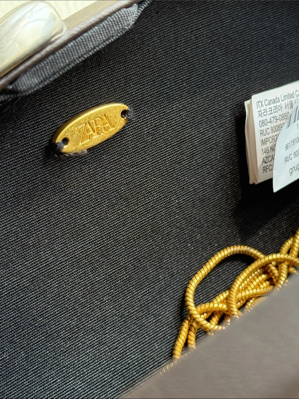 Zara Oval Dark BrownClutch with Metallic Accents